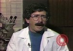 Image of cure for baldness in men United States USA, 1990, second 18 stock footage video 65675036379