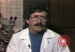 Image of cure for baldness in men United States USA, 1990, second 21 stock footage video 65675036379