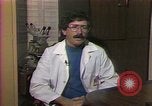 Image of cure for baldness in men United States USA, 1990, second 23 stock footage video 65675036379