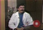 Image of cure for baldness in men United States USA, 1990, second 24 stock footage video 65675036379