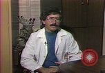 Image of cure for baldness in men United States USA, 1990, second 25 stock footage video 65675036379