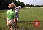 Standbild nationalen Blinden Golf Championship Florida United States USA, 1990, aus Sekunde 57 historischem Filmmaterial Videoclip 65675036381