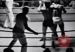 Standbild Vintage wrestling 1930s Florida United States USA, 1937, aus Sekunde 22 historischem Filmmaterial Videoclip 65675036427