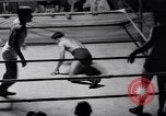 Standbild Vintage wrestling 1930s Florida United States USA, 1937, aus Sekunde 27 historischem Filmmaterial Videoclip 65675036427