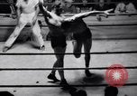 Standbild Vintage wrestling 1930s Florida United States USA, 1937, aus Sekunde 35 historischem Filmmaterial Videoclip 65675036427