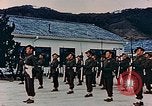 Standbild australische Truppen in Japan nach Zweiten Weltkrieg Nagasaki Japan, 1945, aus Sekunde 22 historischem Filmmaterial Videoclip 65675036519