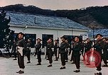 Standbild australische Truppen in Japan nach Zweiten Weltkrieg Nagasaki Japan, 1945, aus Sekunde 25 historischem Filmmaterial Videoclip 65675036519