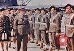 Standbild British Commonwealth troop review in Japan nach Zweiten Weltkrieg Kure Japan, 1946, aus Sekunde 27 historischem Filmmaterial Videoclip 65675036520