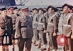 Standbild British Commonwealth troop review in Japan nach Zweiten Weltkrieg Kure Japan, 1946, aus Sekunde 29 historischem Filmmaterial Videoclip 65675036520
