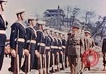 Standbild British Commonwealth troop review in Japan nach Zweiten Weltkrieg Kure Japan, 1946, aus Sekunde 52 historischem Filmmaterial Videoclip 65675036520