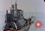 Image of HMIS SUTLEJ sinking Japanese submarine I-155 Japan, 1946, second 16 stock footage video 65675036522