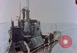 Image of HMIS SUTLEJ sinking Japanese submarine I-155 Japan, 1946, second 17 stock footage video 65675036522