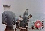 Image of HMIS SUTLEJ sinking Japanese submarine I-155 Japan, 1946, second 29 stock footage video 65675036522