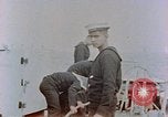 Image of HMIS SUTLEJ sinking Japanese submarine I-155 Japan, 1946, second 32 stock footage video 65675036522