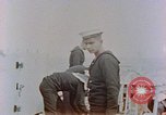 Image of HMIS SUTLEJ sinking Japanese submarine I-155 Japan, 1946, second 33 stock footage video 65675036522