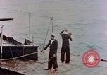 Image of HMIS SUTLEJ sinking Japanese submarine I-155 Japan, 1946, second 37 stock footage video 65675036522