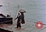 Image of HMIS SUTLEJ sinking Japanese submarine I-155 Japan, 1946, second 38 stock footage video 65675036522
