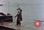 Image of HMIS SUTLEJ sinking Japanese submarine I-155 Japan, 1946, second 39 stock footage video 65675036522