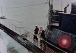 Image of HMIS SUTLEJ sinking Japanese submarine I-155 Japan, 1946, second 50 stock footage video 65675036522
