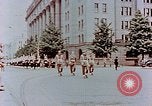 Image of British forces march at Japanese Imperial Palace Plaza Japan, 1946, second 12 stock footage video 65675036525