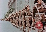 Image of British forces march at Japanese Imperial Palace Plaza Japan, 1946, second 43 stock footage video 65675036525