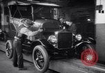 Image of fifteen millionth Ford Model T car Highland Park Michigan USA, 1927, second 25 stock footage video 65675036566