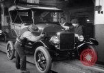 Image of fifteen millionth Ford Model T car Highland Park Michigan USA, 1927, second 28 stock footage video 65675036566