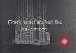 Image of General Motors truck assembly line Pontiac Michigan USA, 1923, second 1 stock footage video 65675036582