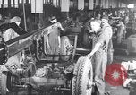 Image of General Motors truck assembly line Pontiac Michigan USA, 1923, second 23 stock footage video 65675036582