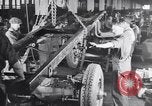 Image of General Motors truck assembly line Pontiac Michigan USA, 1923, second 27 stock footage video 65675036582