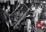 Image of General Motors truck assembly line Pontiac Michigan USA, 1923, second 29 stock footage video 65675036582