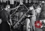 Image of General Motors truck assembly line Pontiac Michigan USA, 1923, second 30 stock footage video 65675036582
