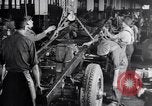 Image of General Motors truck assembly line Pontiac Michigan USA, 1923, second 32 stock footage video 65675036582