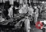 Image of General Motors truck assembly line Pontiac Michigan USA, 1923, second 44 stock footage video 65675036582