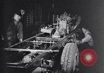 Image of General Motors truck assembly line Pontiac Michigan USA, 1923, second 47 stock footage video 65675036582