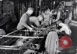Image of General Motors truck assembly line Pontiac Michigan USA, 1923, second 52 stock footage video 65675036582
