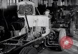 Image of General Motors truck assembly line Pontiac Michigan USA, 1923, second 56 stock footage video 65675036582