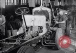 Image of General Motors truck assembly line Pontiac Michigan USA, 1923, second 60 stock footage video 65675036582
