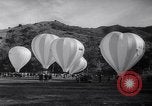 Image of Participants take off on hot air balloon race Catalina Island California USA, 1964, second 5 stock footage video 65675036642