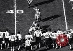 Image of football match Los Angeles California USA, 1956, second 15 stock footage video 65675036667