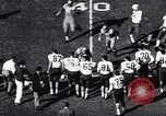 Image of football match Los Angeles California USA, 1956, second 16 stock footage video 65675036667