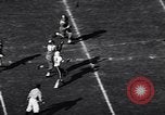 Image of football match Los Angeles California USA, 1956, second 21 stock footage video 65675036667