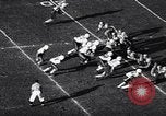 Image of football match Los Angeles California USA, 1956, second 42 stock footage video 65675036667