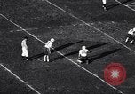 Image of football match Los Angeles California USA, 1956, second 51 stock footage video 65675036667