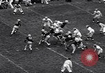 Immagine di Partita di calcio Iowa City Iowa USA, 1956, secondo 6 filmato di repertorio 65675036668