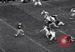 Immagine di Partita di calcio Iowa City Iowa USA, 1956, secondo 8 filmato di repertorio 65675036668