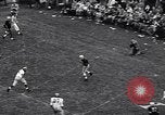 Immagine di Partita di calcio Iowa City Iowa USA, 1956, secondo 11 filmato di repertorio 65675036668