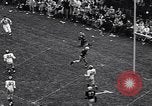 Immagine di Partita di calcio Iowa City Iowa USA, 1956, secondo 12 filmato di repertorio 65675036668