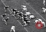 Immagine di Partita di calcio Iowa City Iowa USA, 1956, secondo 16 filmato di repertorio 65675036668