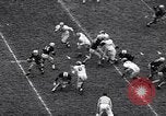 Immagine di Partita di calcio Iowa City Iowa USA, 1956, secondo 19 filmato di repertorio 65675036668
